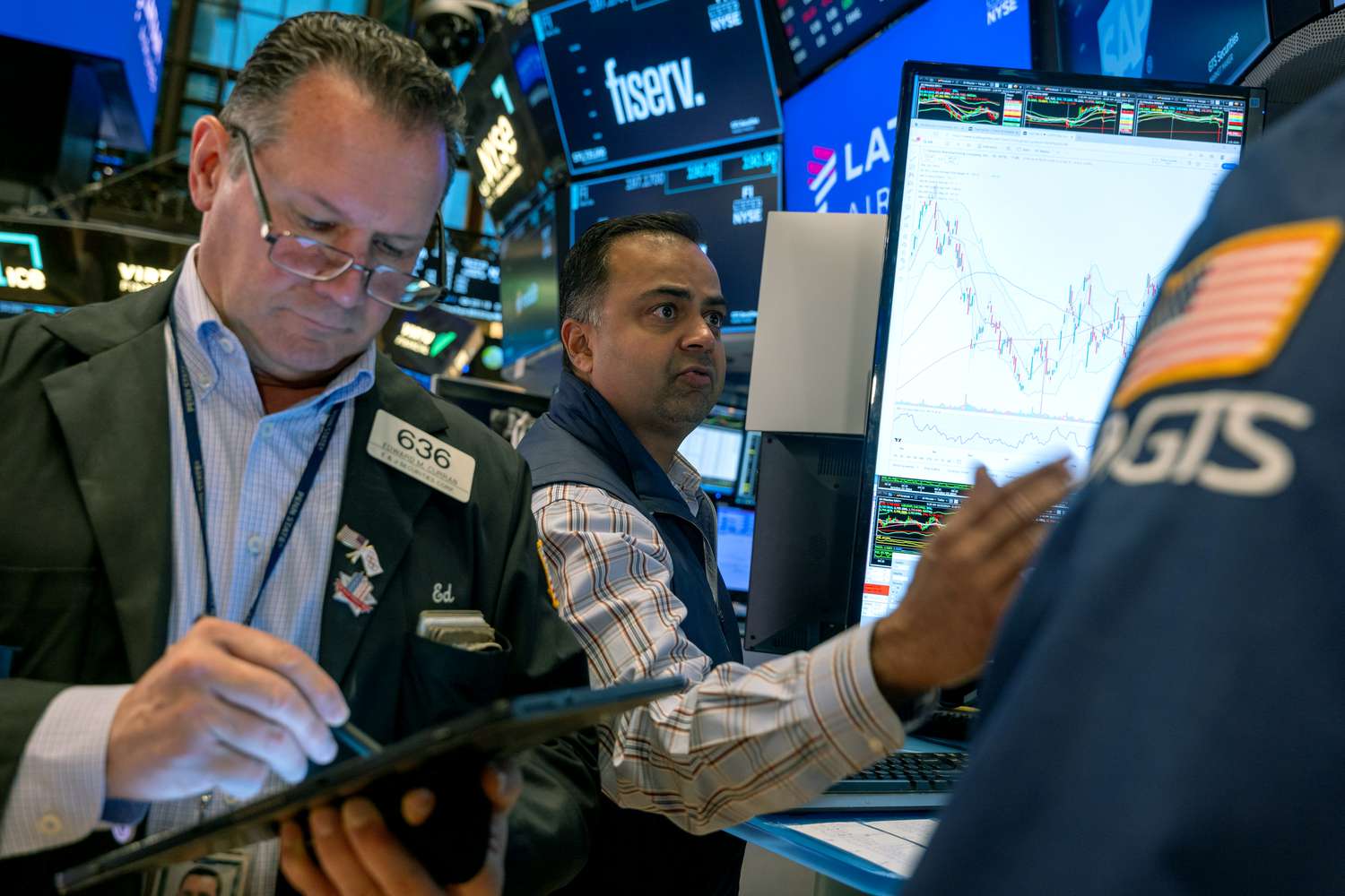 Traders work on the floor of the New York Stock Exchange 