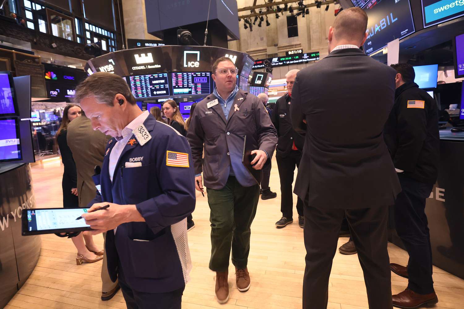 Traders work on the floor of the New York Stock Exchange 