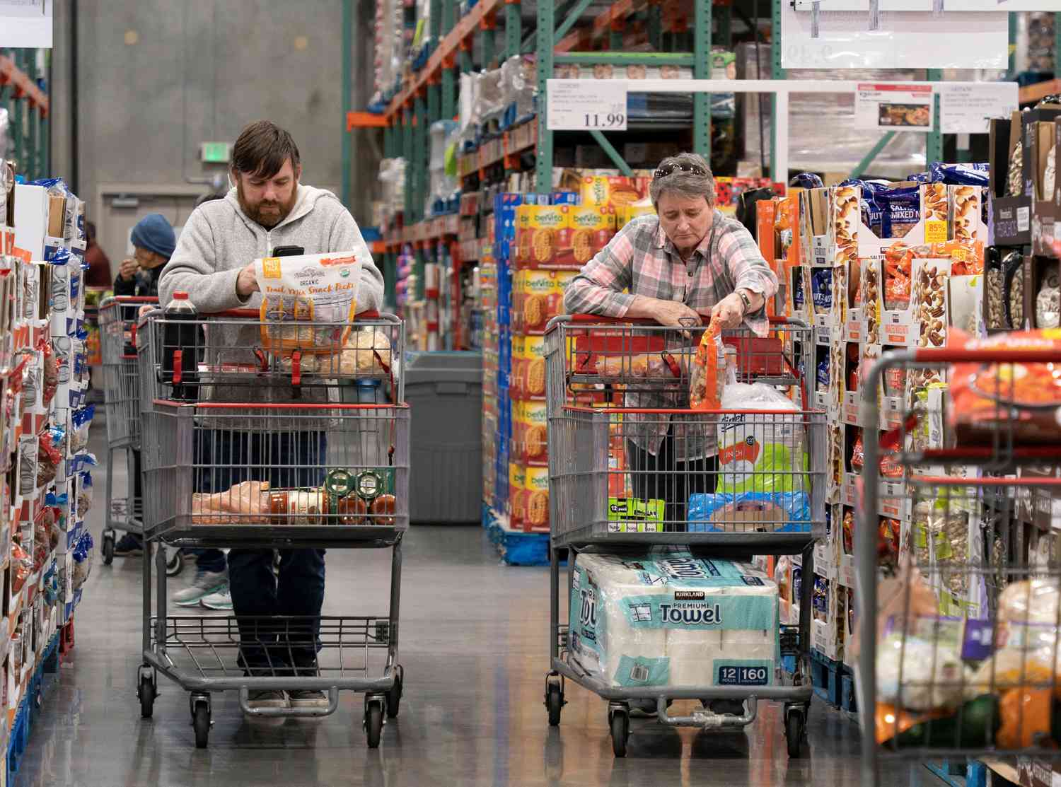 People shop at a supermarket in Foster City, California, the United States, Jan. 11, 2024