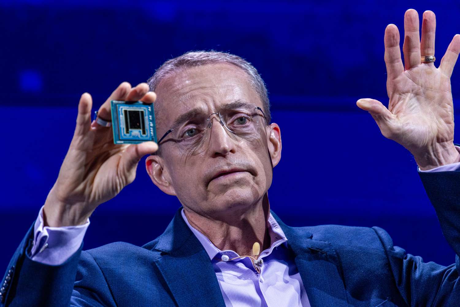 Pat Gelsinger, chief executive officer of Intel Corp., holds an artificial intelligence processor as he speaks during the Computex conference in Taipei, Taiwan, on Tuesday, June 4, 2024. 