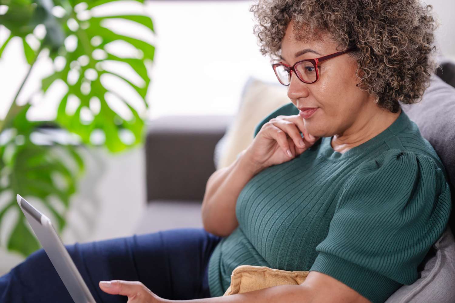 Woman considering whether she should use a home equity loan to buy crypto