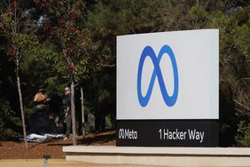 A sign with a new logo and the name Meta is displayed in front of Facebook headquarters in Menlo Park, California, on Oct. 28, 2021.