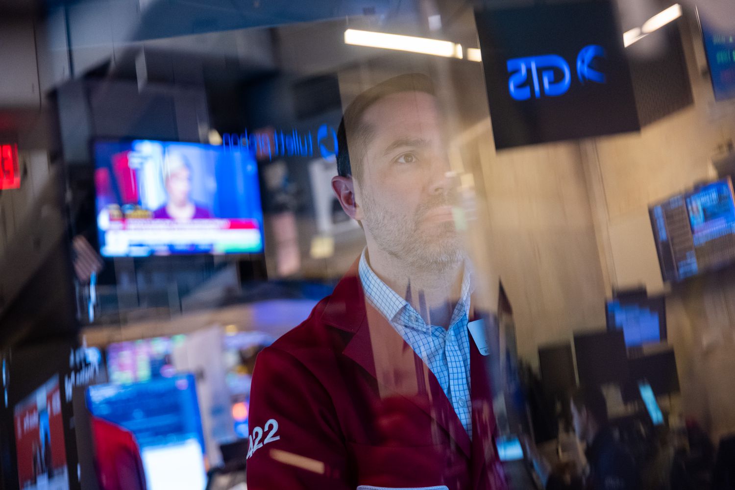 Traders work on the floor of the New York Stock Exchange