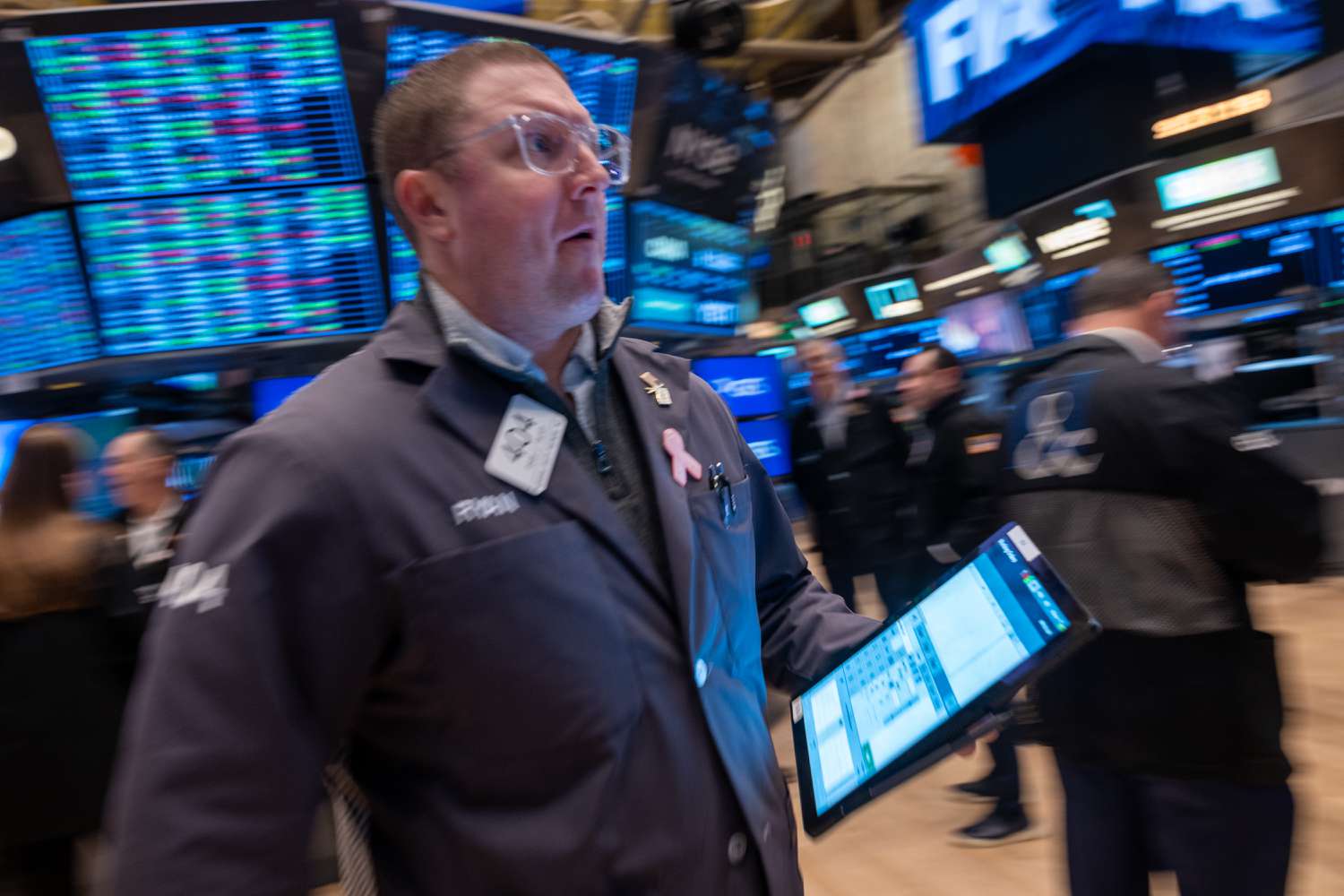 Traders work on the floor of the New York Stock Exchange.