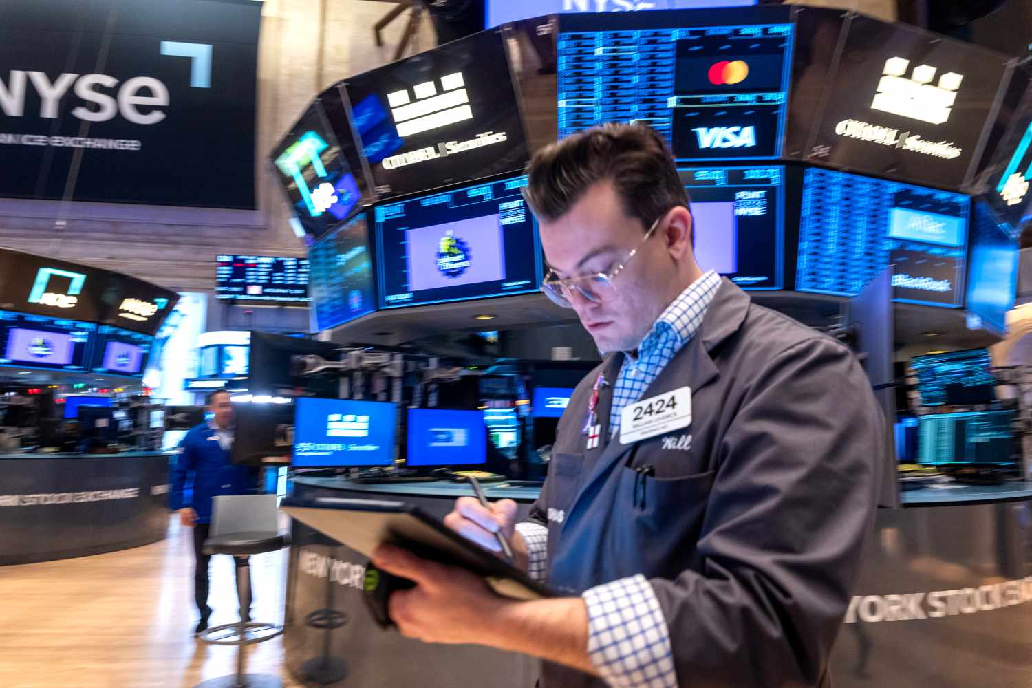 Traders work on the floor of the New York Stock Exchange 