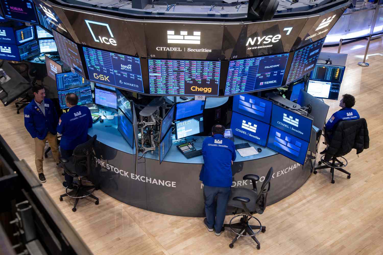 Traders work on the floor of the New York Stock Exchange