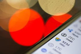 Logos of virtual currencies including the NEM coin against Japanese yen are seen on Coincheck's cryptocurrency wallet app in this arranged photograph on January 29, 2018 in Tokyo, Japan. 