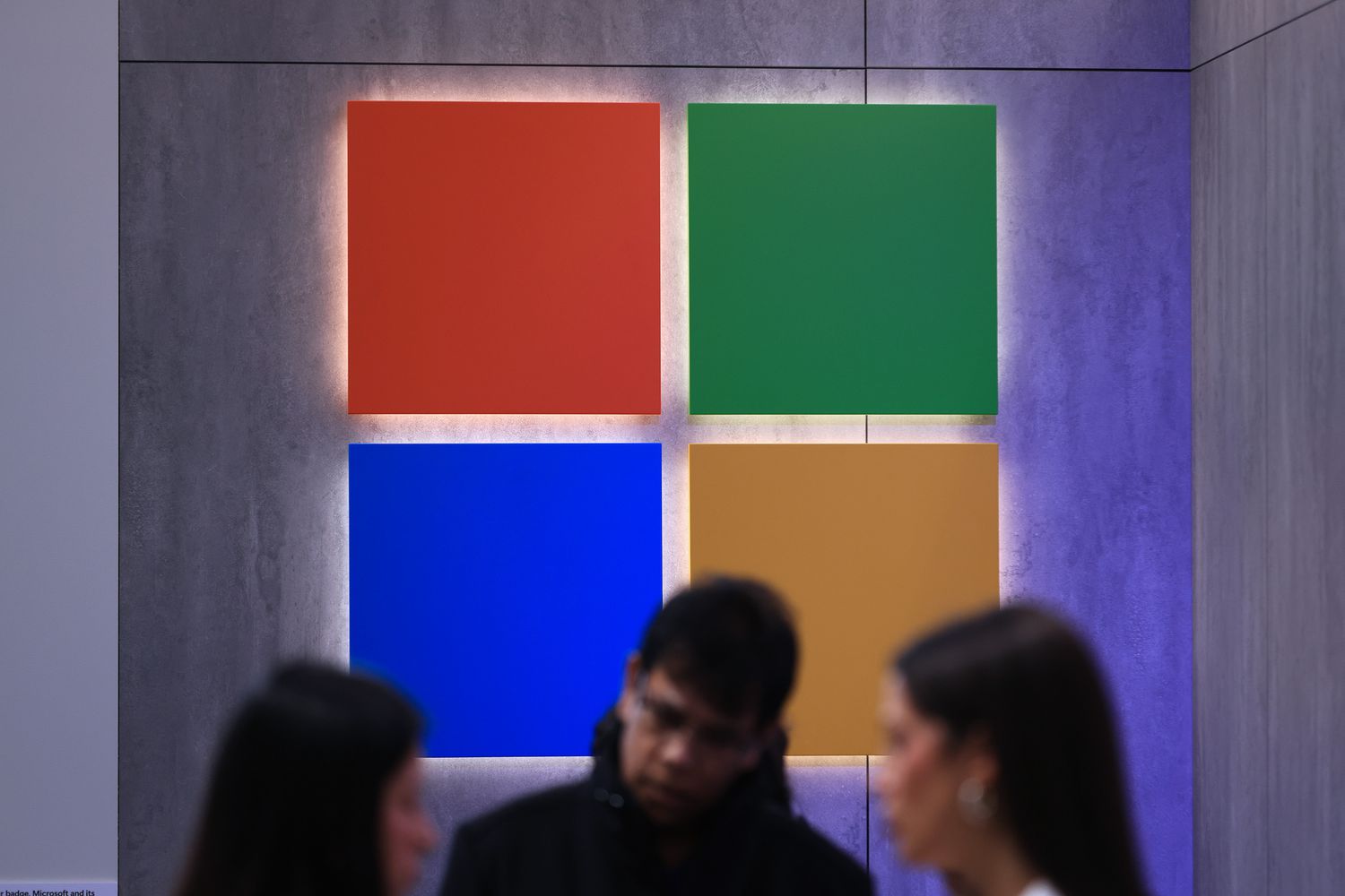 Microsoft logo at the company's booth at a trade fair.