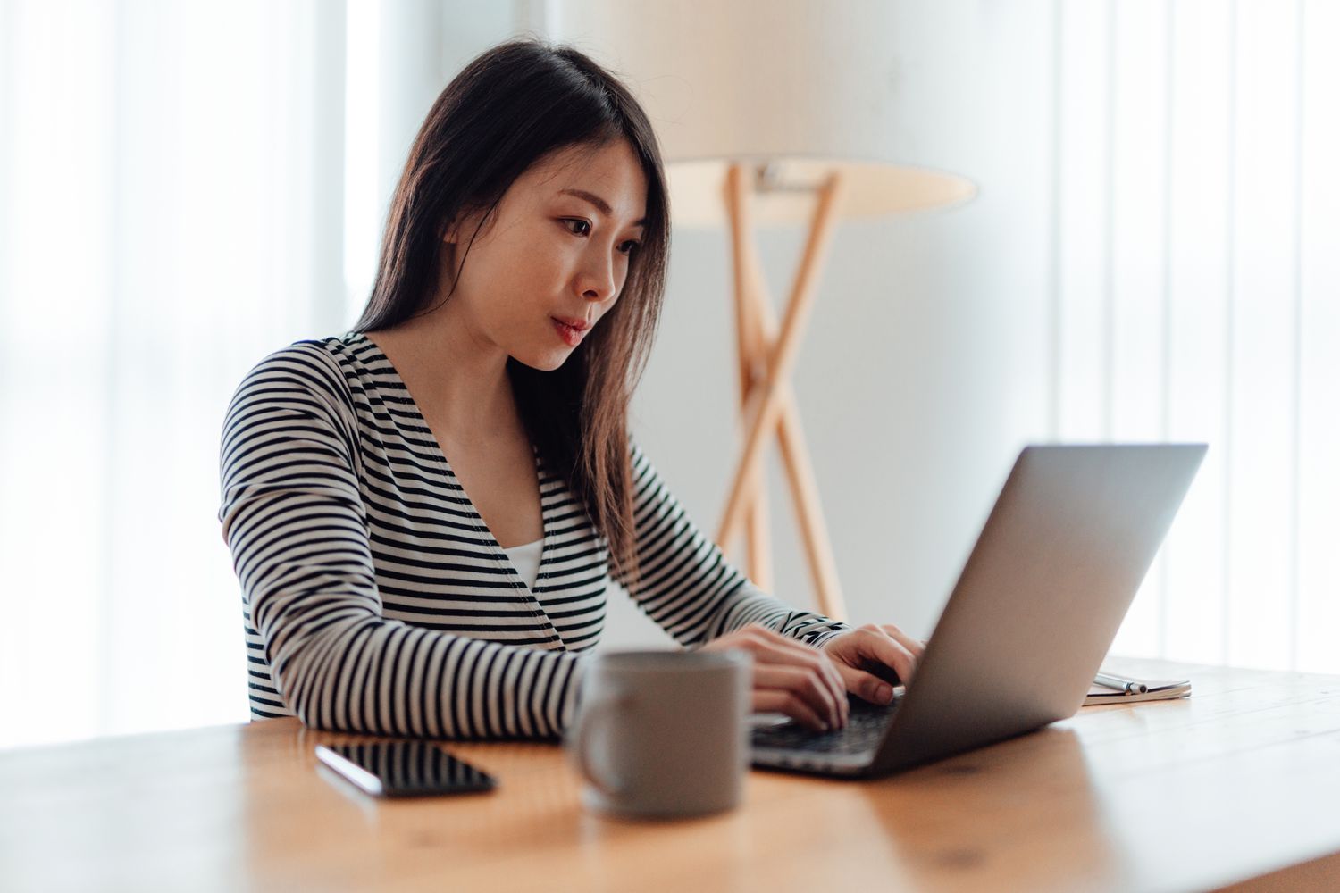 Woman paying bills