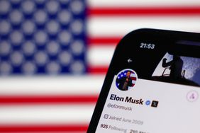 American flag displayed on a laptop screen and Elon Musk account on X displayed on a phone screen