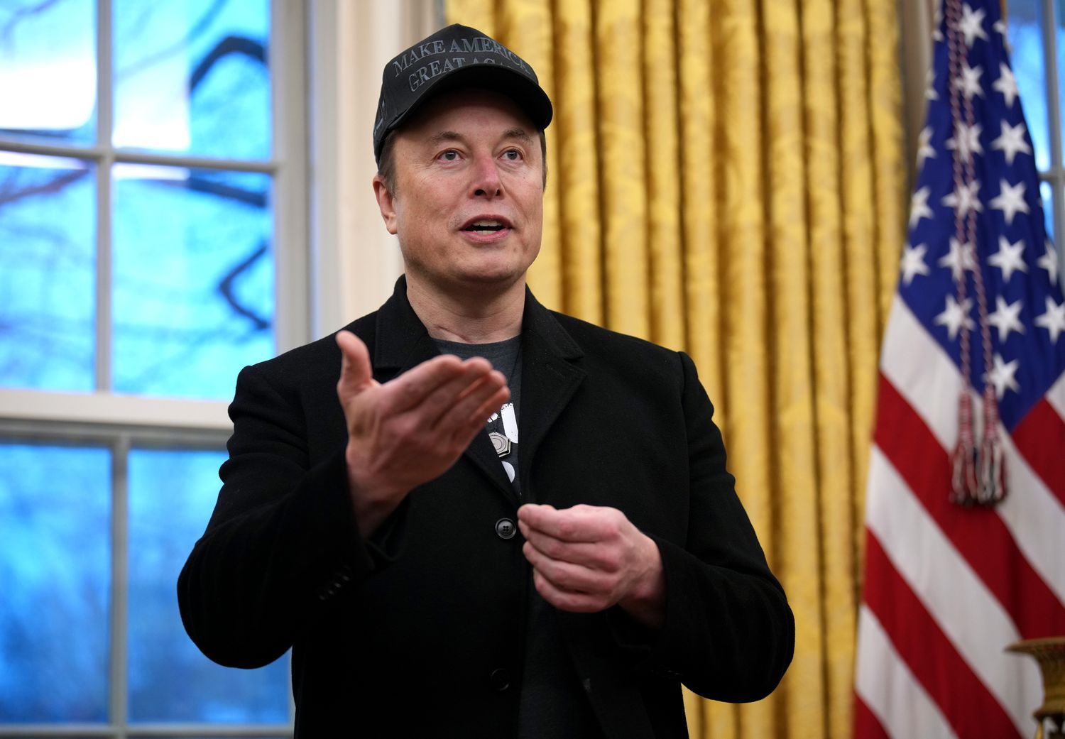 Tesla and SpaceX CEO Elon Musk delivers remarks as he join U.S. President Donald Trump during an executive order signing in the Oval Office.