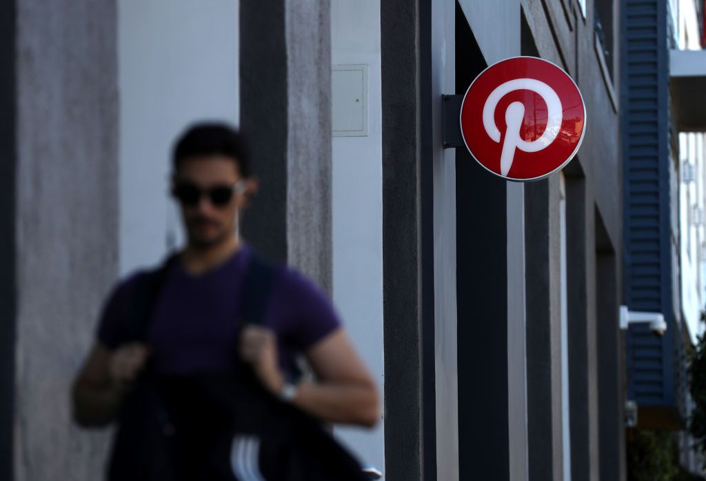 A pedestrian walks by the Pinterest headquarters on April 09, 2019 in San Francisco, California. 