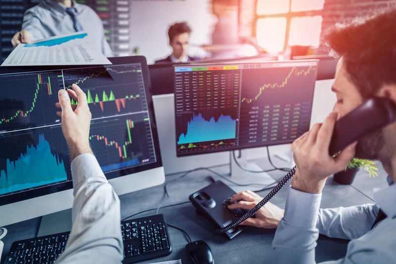 Business team deal on a stock exchange.