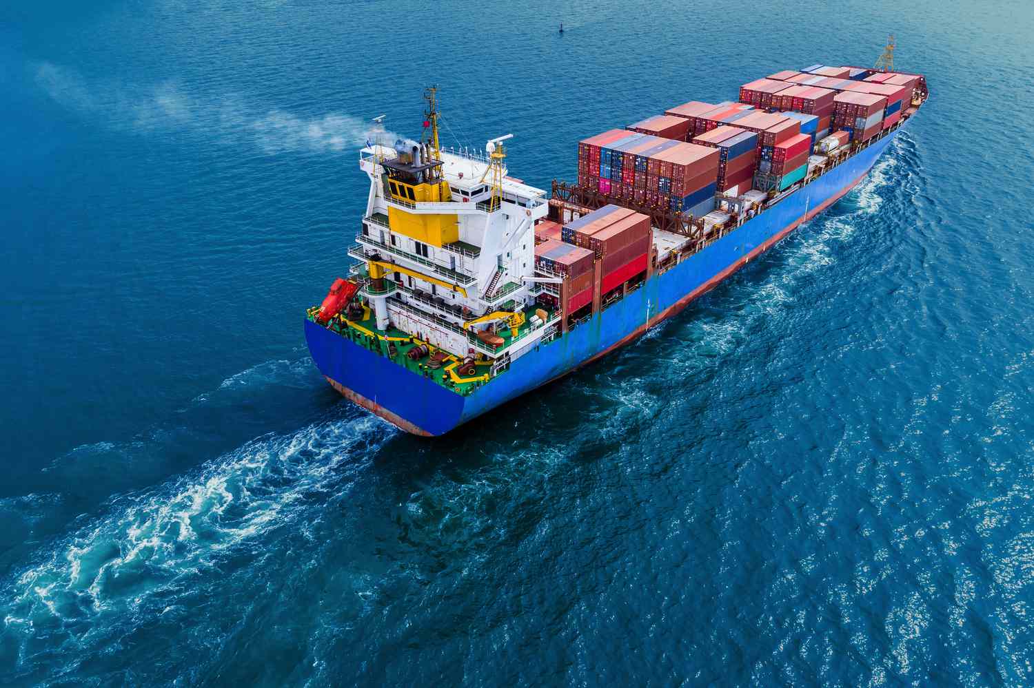 Container ship moving in the water
