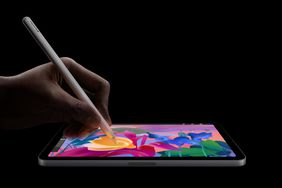 A person uses an Apple Pencil on the new iPad Mini