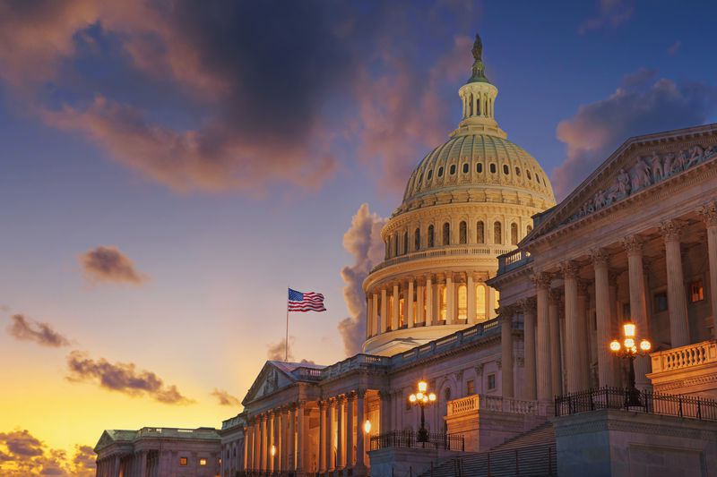 U.S. Capitol building at sunset, Washington, D.C., USA.