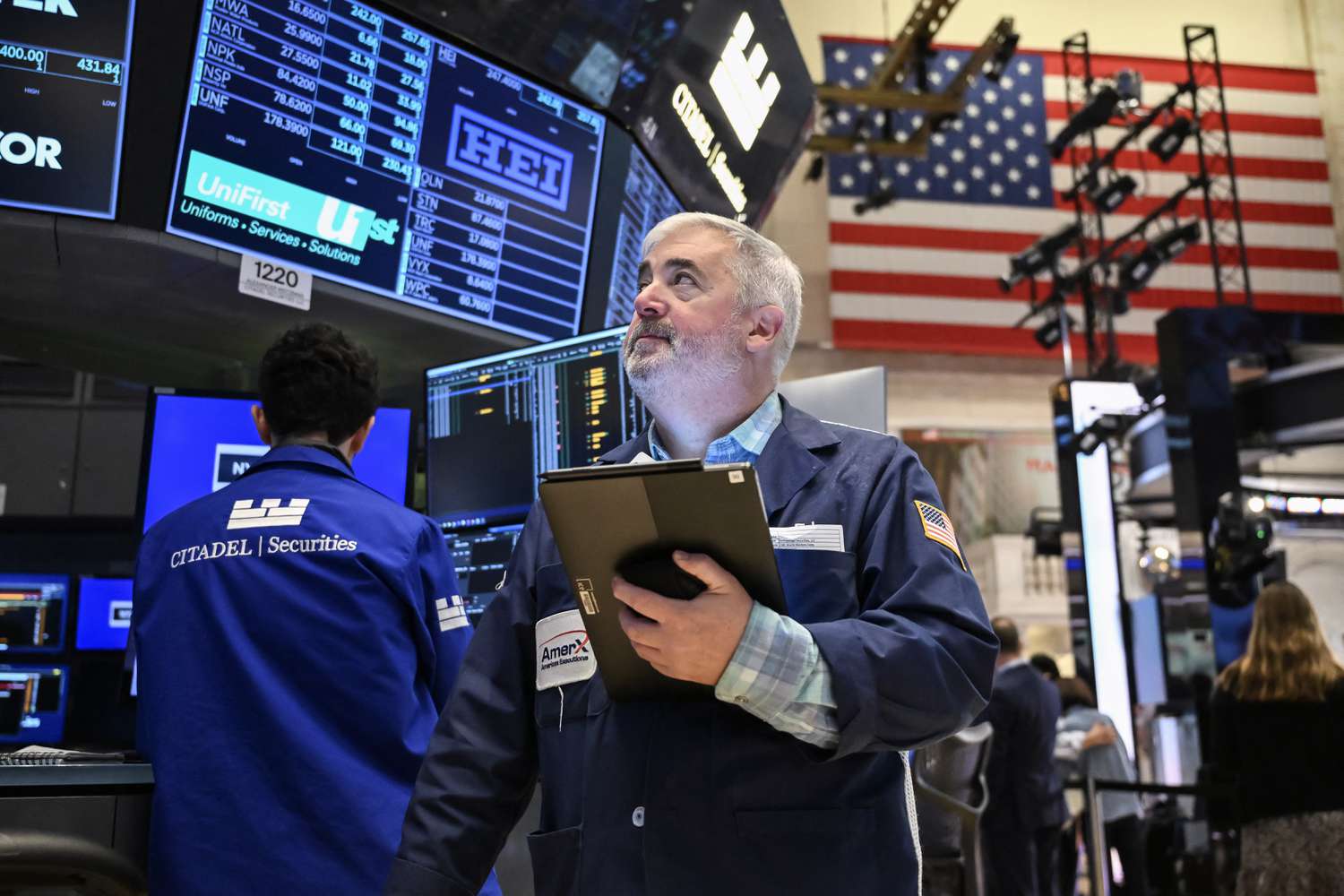 Traders work on the floor of the New York Stock Exchange.