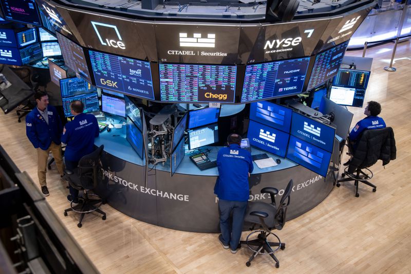 Traders work on the floor of the New York Stock Exchange