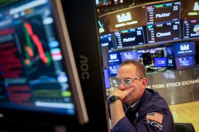 A trader works on the floor of the New York Stock Exchange