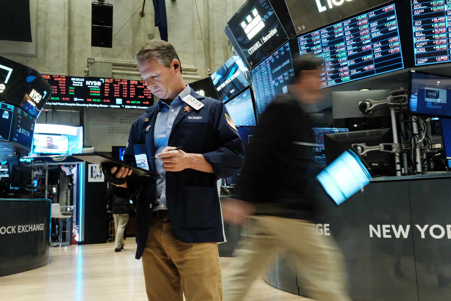 Traders on the floor of the stock exchange