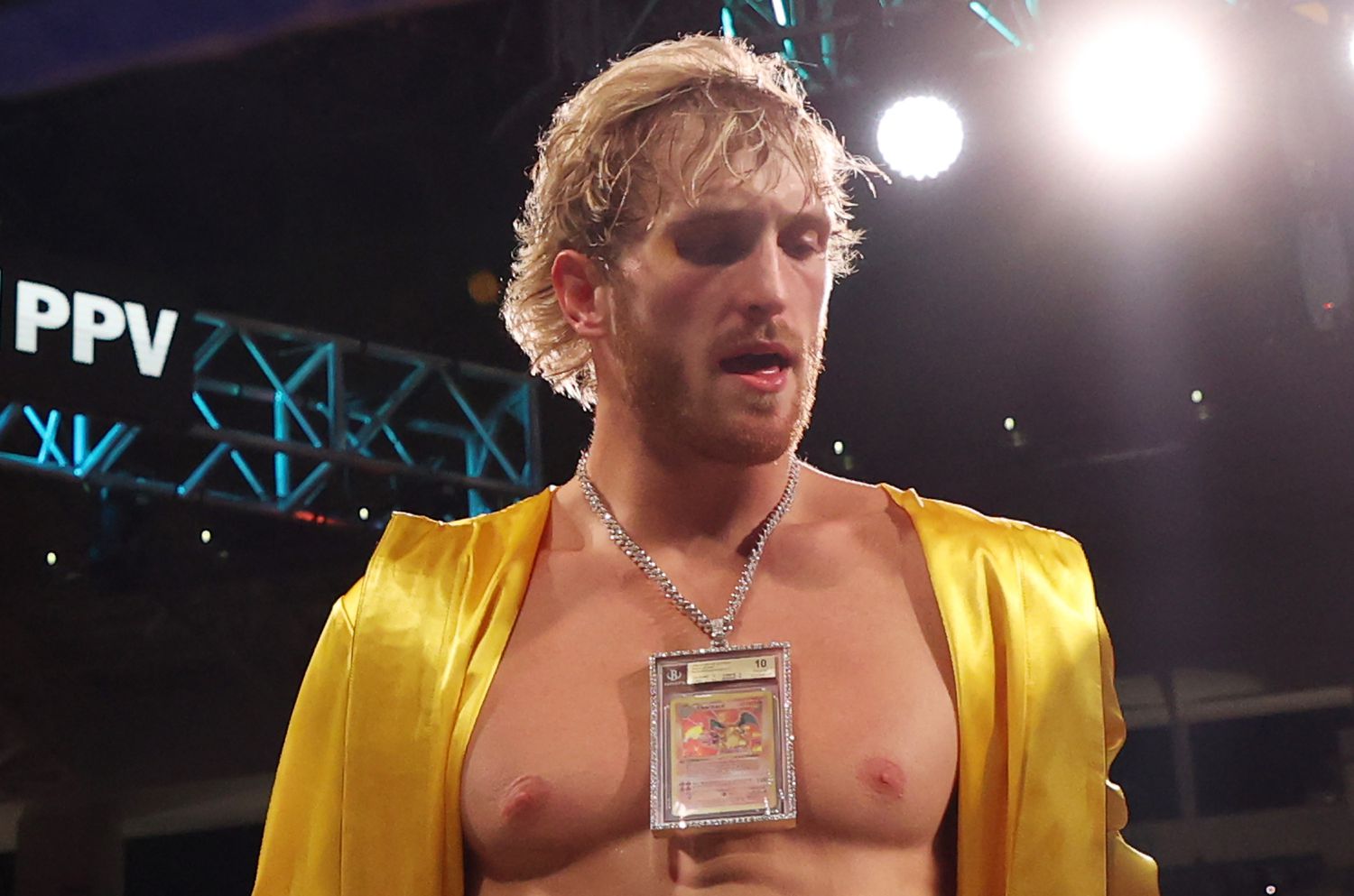 Logan Paul with a Pokemon card around his neck in 2021. 