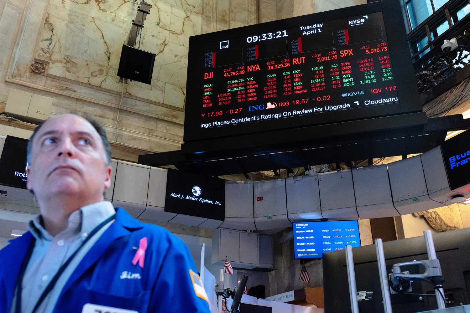 Traders work on the floor of the New York Stock Exchange.