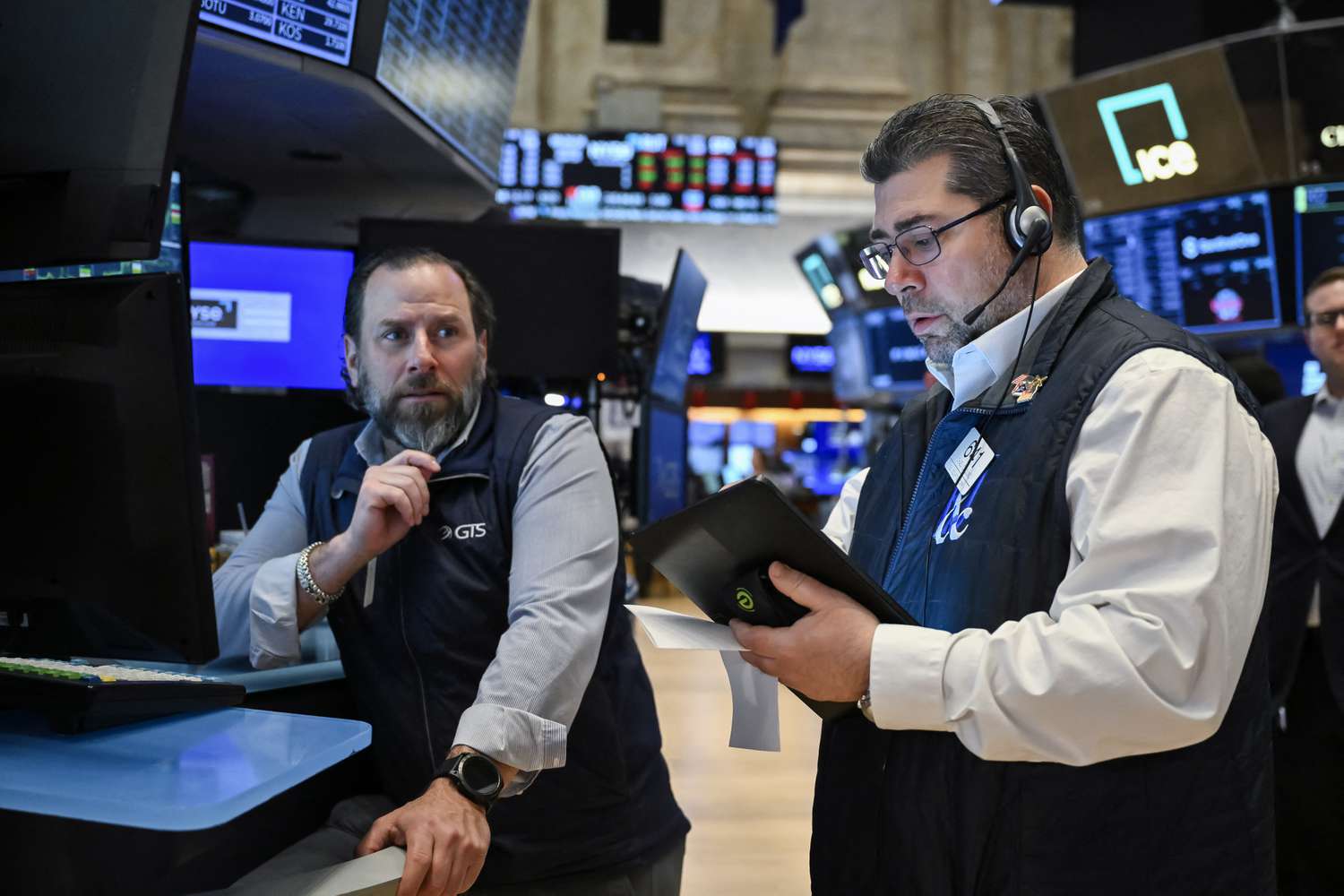 Traders work on the floor of the New York Stock Exchange.