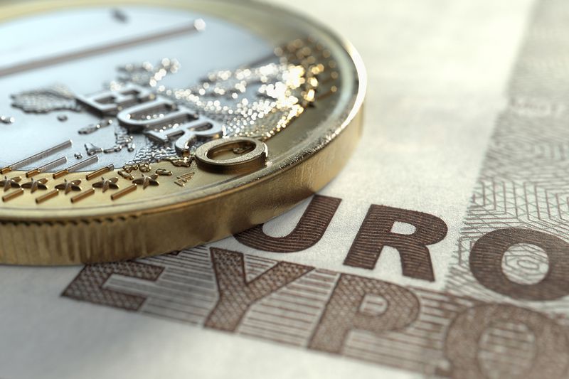 Euro Coin on Euro Note