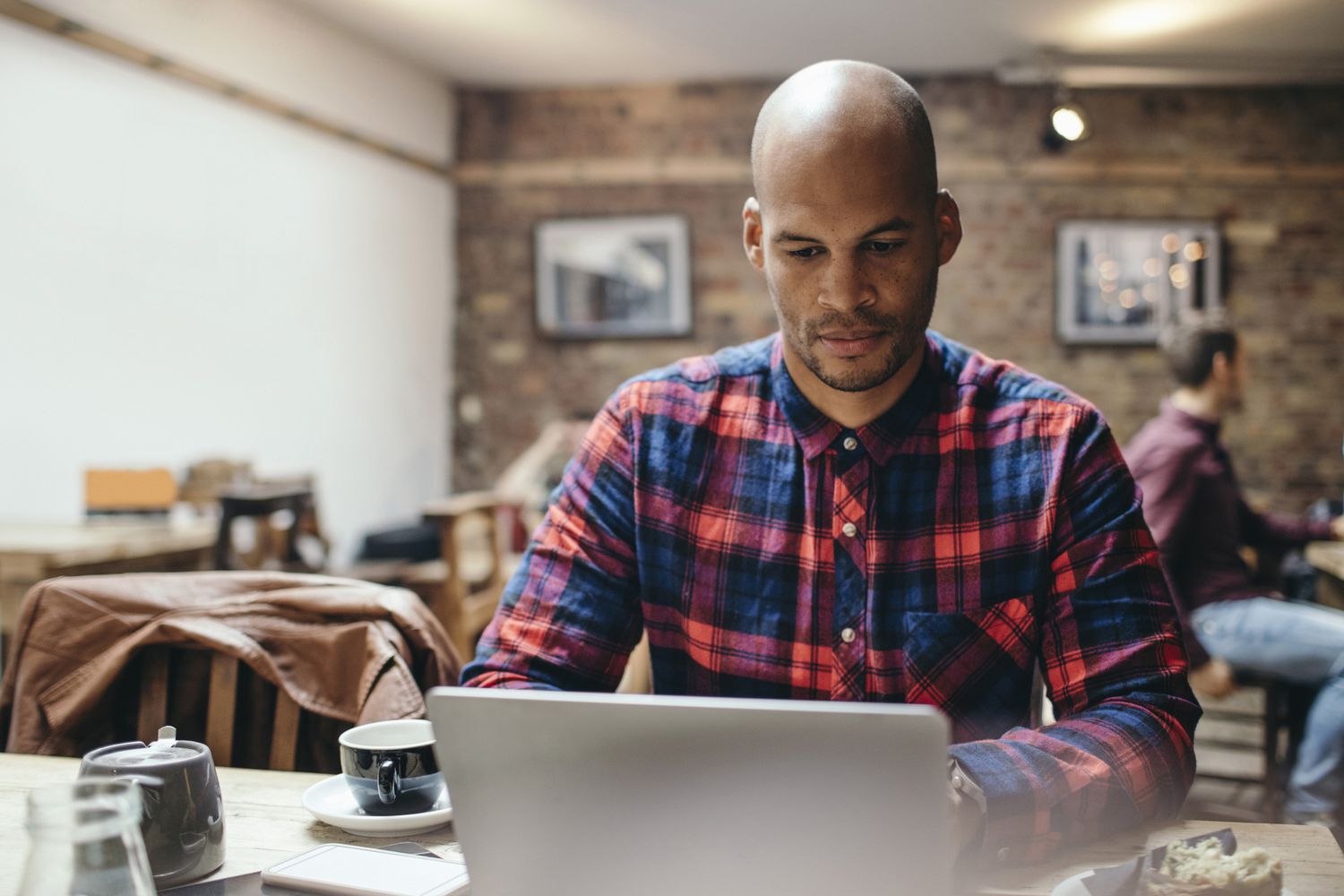 A person compares interest rates for different loans