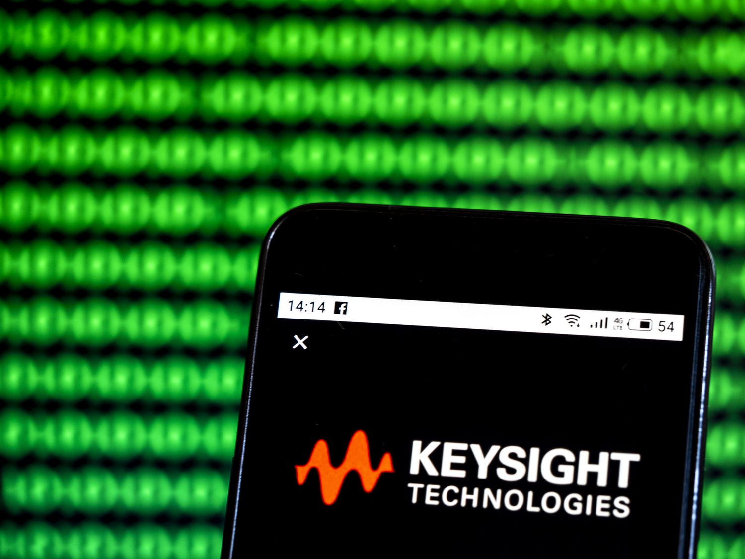 An illustration of the Keysight Technologies logo on a mobile device. 