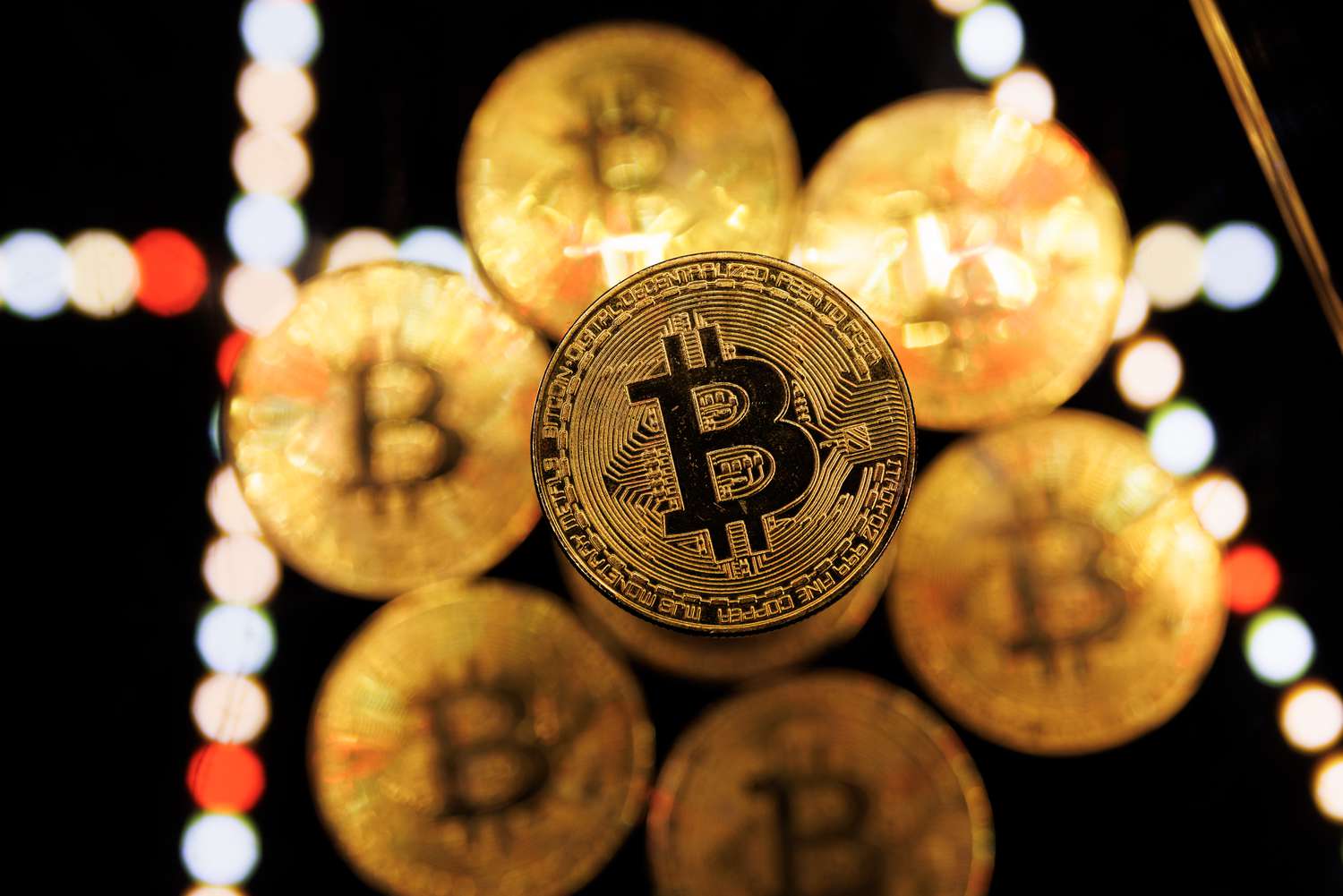 A photo illustration depicting bitcoin. 