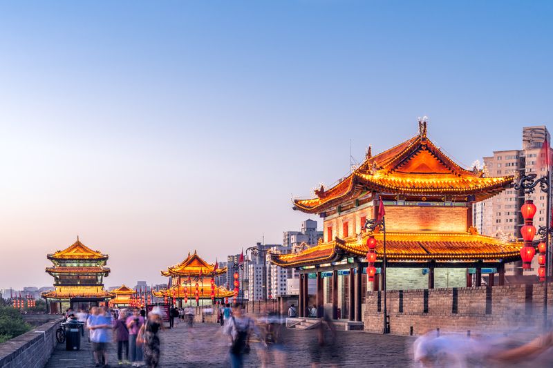 city scape with people and ancient Chinese buildings