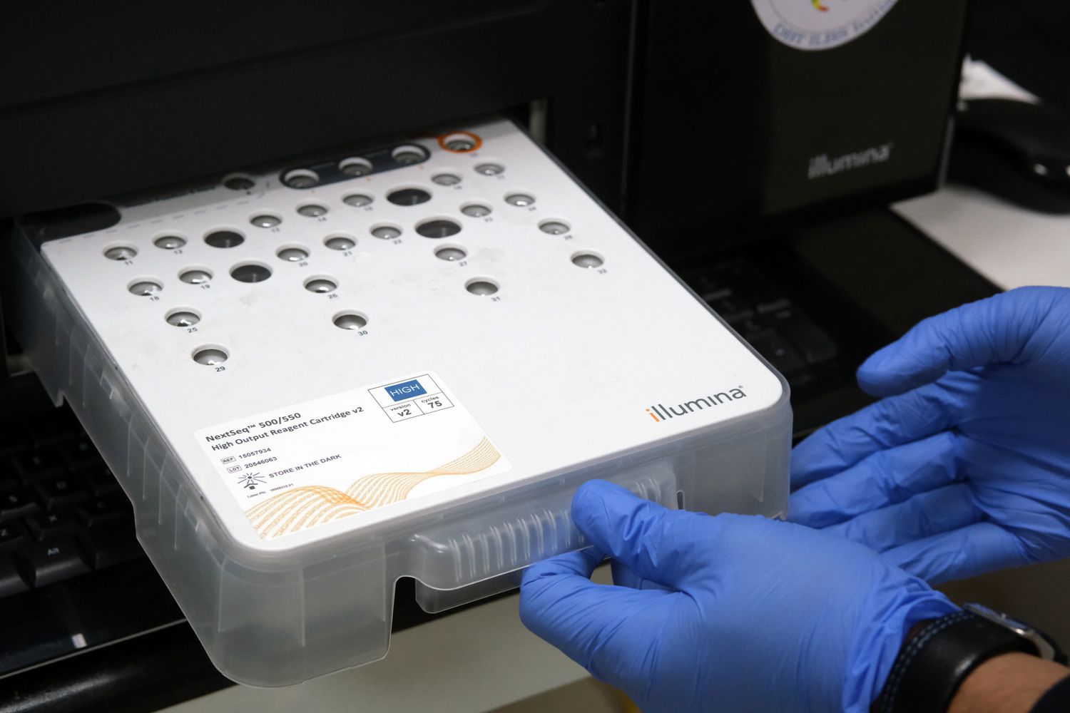 Technician using an Illumina product.