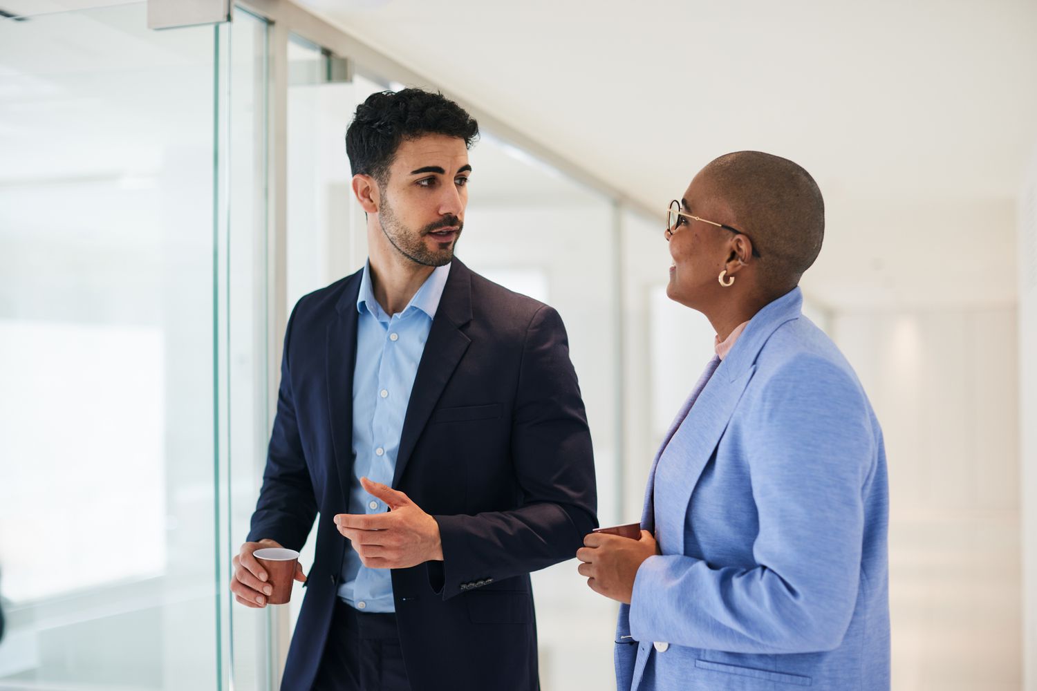 Colleagues discussing whether to get an SBA loan or a conventional loan.
