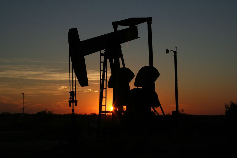Oil derrick in the Texas sunset