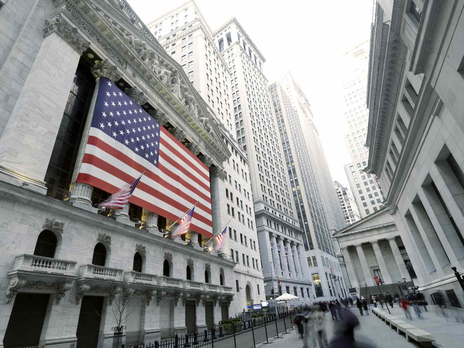 Flags are displayed on the outside of the New York Stock Exchange. 