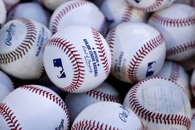 A pile of baseballs used in a spring training game in Arlington, Texas, earlier this month. 
