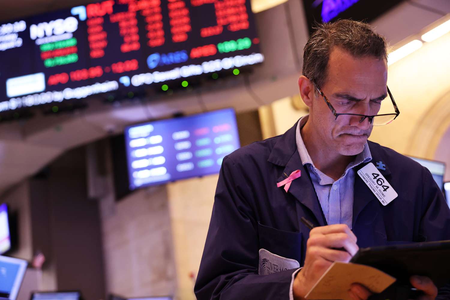 Traders work on the floor of the New York Stock Exchange.