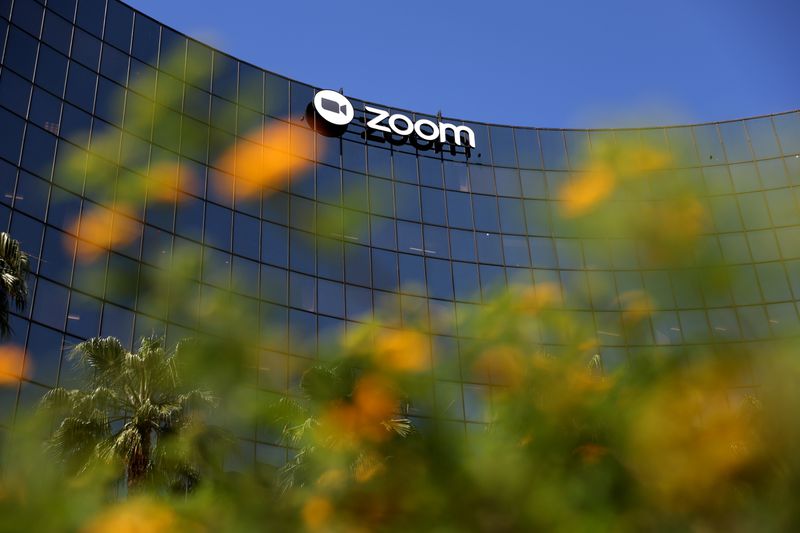 The Zoom logo is visible on the exterior of the Zoom Video Communications headquarters.