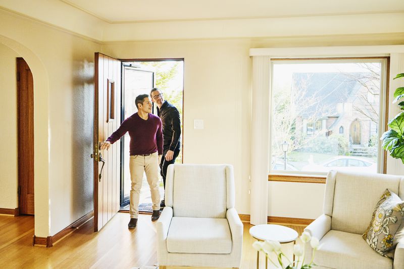 Couple touring their dream house, which they can't afford due to tariffs