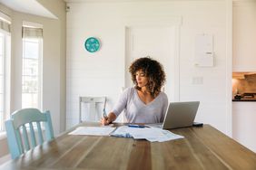 A woman filing her taxes online