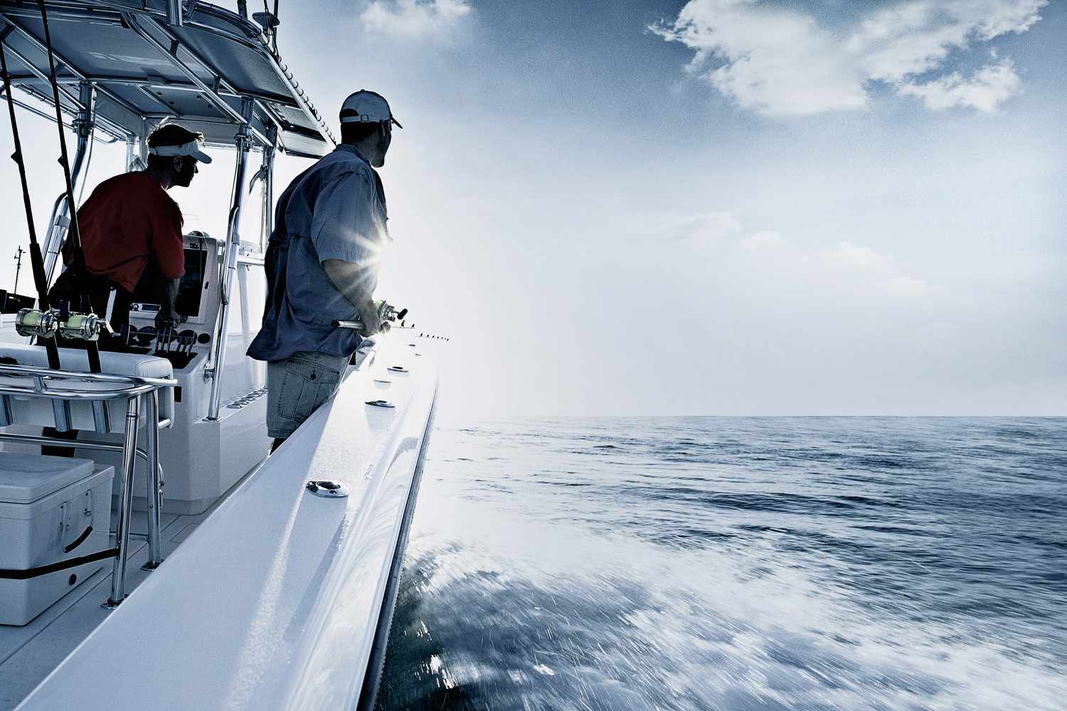Two men in a motorboat.