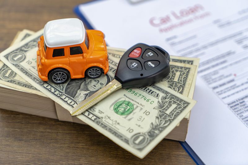 Certificate of motor insurance and policy schedule with car key