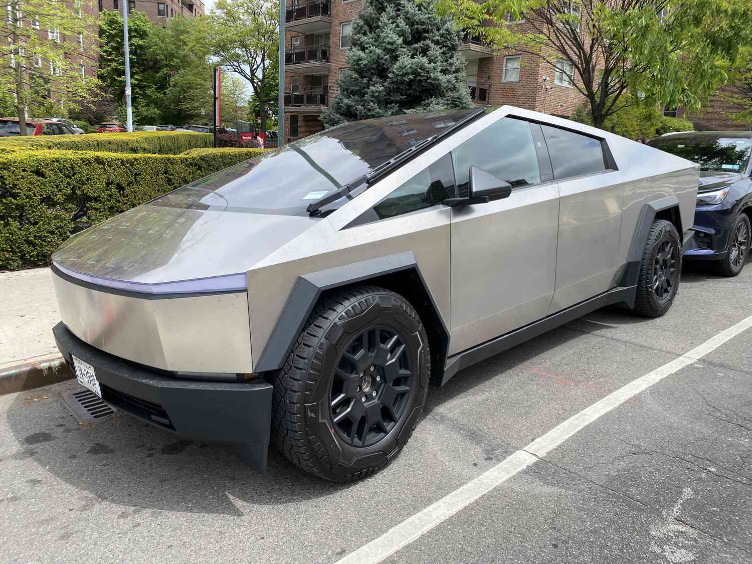 Tesla Cybertruck parked on street in Queens