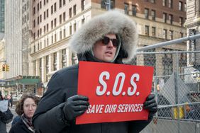 Participant at a protest against the Trump administration's push to cut federal spending, in New York on February 19, 2025.