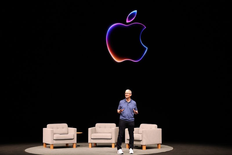 Apple CEO Tim Cook delivers remarks at the start of the Apple Worldwide Developers Conference (WWDC) on June 10, 2024