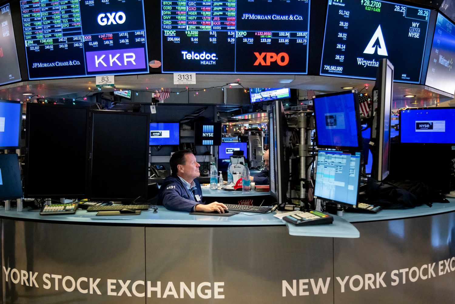 Traders work on the floor of the New York Stock Exchange