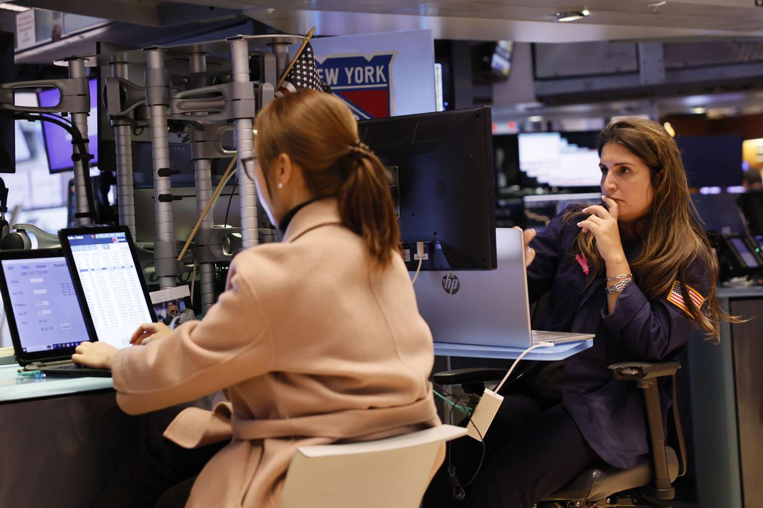 Traders work on the floor of the New York Stock Exchange.