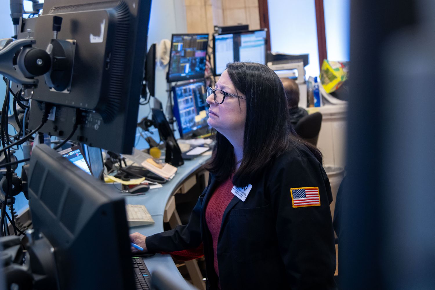 Traders work on the floor of the New York Stock Exchange on Tuesday