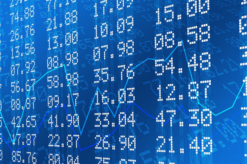 Stock exchange graph and numbers.